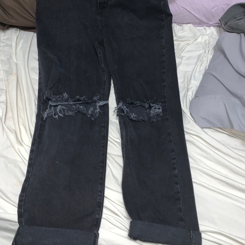 Black ripped, cuffed jeans